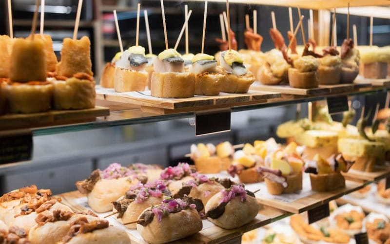 Barcelona: The Ultimate Local Tapas & Drinks Food Tour - Guides like Miguel, Violetta, Daim, and Tomas make the difference