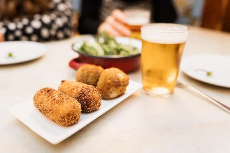Barcelona: The Ultimate Local Tapas & Drinks Food Tour - Meeting at Plaça de l’Angel, then into the Gothic Quarter