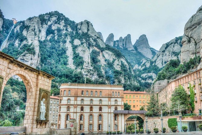 Barcelona to Montserrat Monastery: Tour, Transfers & Basilica - Stop 1: Monistrol de Montserrat, history first, then your own time
