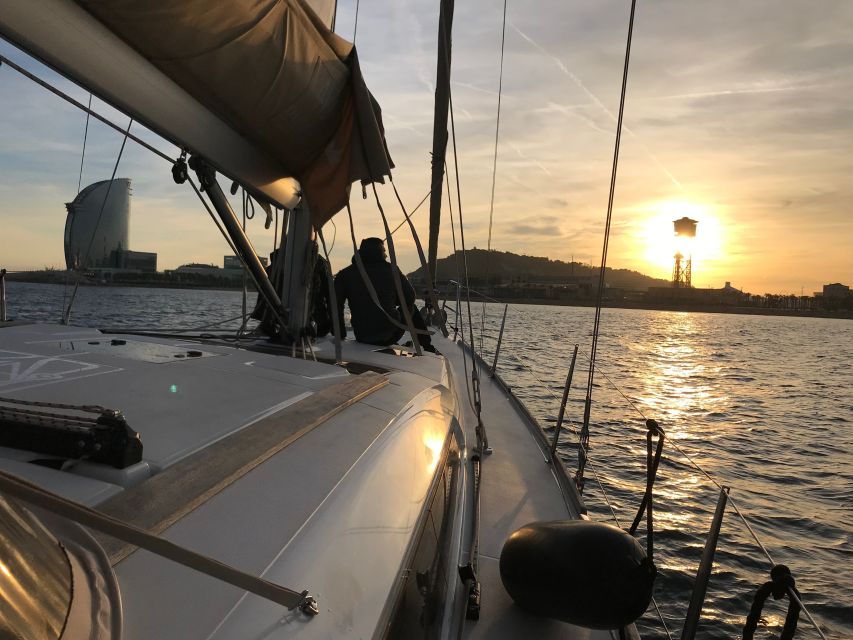 Barcelona: Two-Hour Midday or Sunset Sailing Cruise - The onboard setup: open bar, snacks, and music that actually keep things relaxed