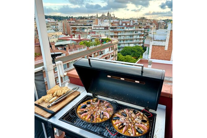 BBQ Paella in a Penthouse Terrace in Barcelona with a Chef - Cooking paella over charcoal: the part you actually do