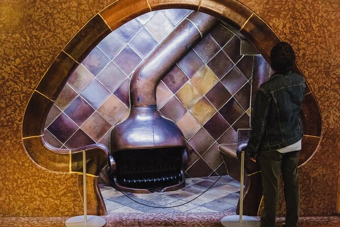 Complete Gaudi Tour: Casa Batllo, Park Guell & Sagrada Familia - Casa Batlló, explained room by room: gills, light, and tile tricks