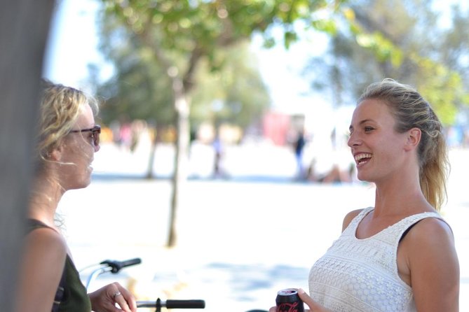 E-Bike tour in Barcelona with English Guide - Getting started at Carrer dEnric Granados 5: bike fitting and safety first