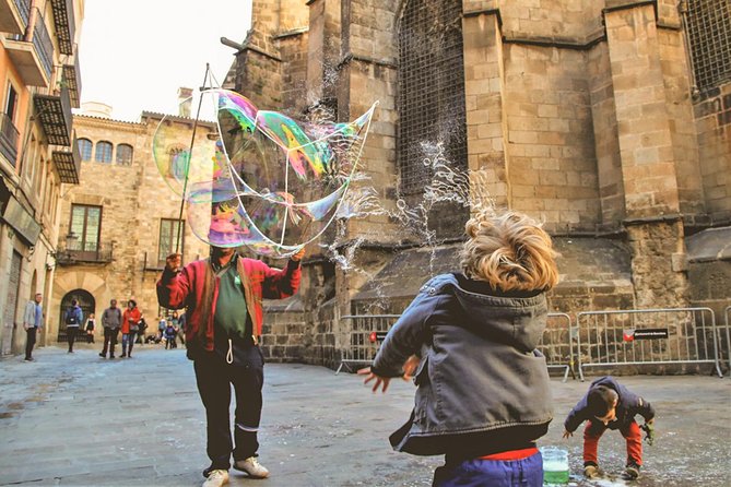 Family Private Tour: Churros, Hot Chocolate & Games in Barcelona - Las Ramblas and Plaça Reial: classic street scenes, quick wins