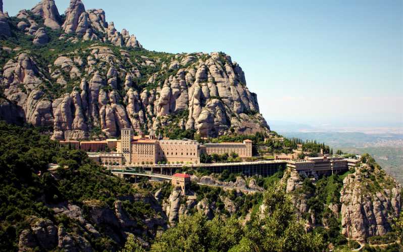 From Barcelona: Half-Day Trip to Montserrat Mountain - Montserrat monastery and church tour, with the Virgin of Montserrat