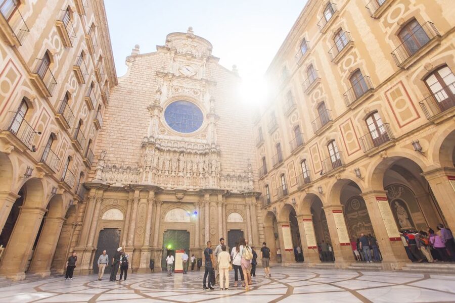 From Barcelona: Montserrat Half-Day Wine and Tapas Trip - Getting there: bus time, meeting point, and how the group day runs