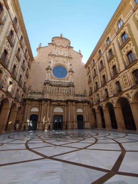 From Barcelona: Montserrat Monastery & Hike with Cable Car - Transport, timing, and small-group comfort (up to 8 people)