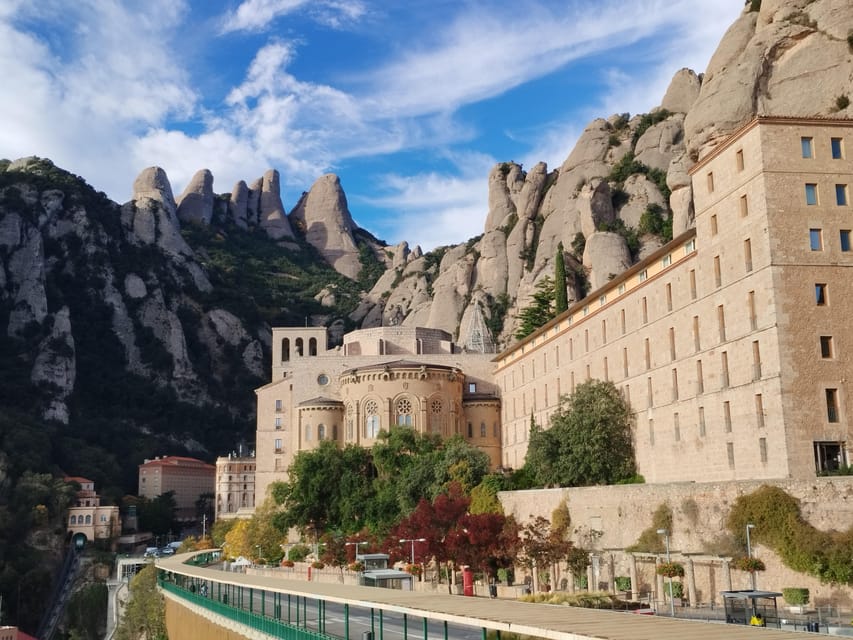 From Barcelona: Montserrat Monastery & Hike with Cable Car - Entering the Benedictine Abbey with skip-the-line time