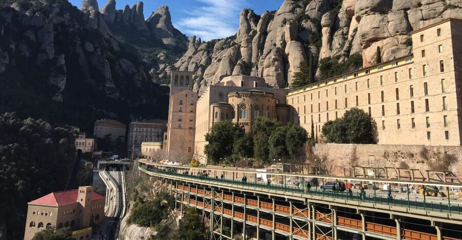 From Barcelona: Montserrat Monastery & Scenic Mountain Hike - The Benedictine Abbey: 11th-century faith and the Black Madonna