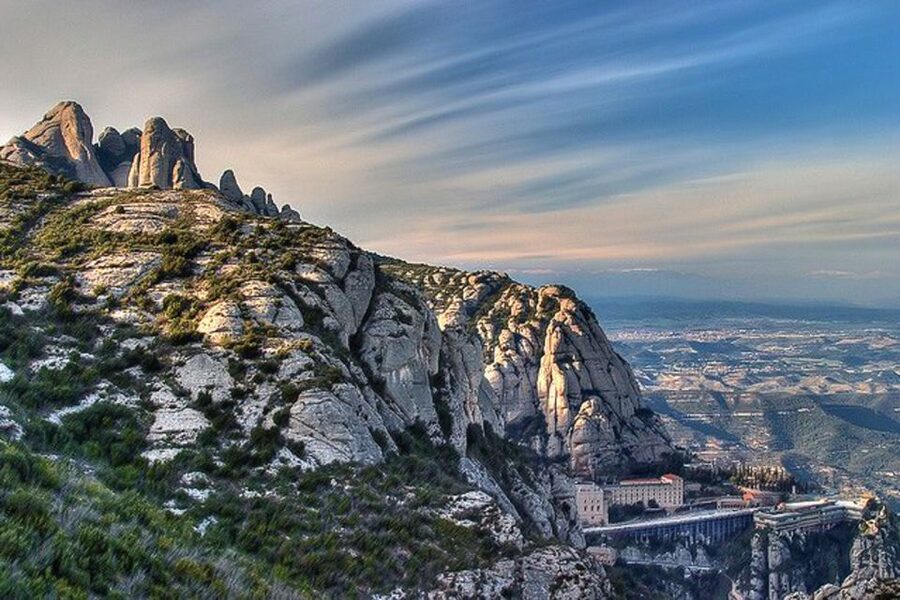 From Barcelona: Montserrat Tour, Rack Railway & Licor Taste - Morenata: the Romanesque polychrome carving tied to Catalonia