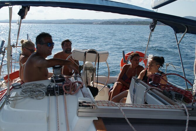 Full Day Private Sailboat Tour from Sitges - Boat comfort on deck: sun time, maxi cushions, and a relaxed setup