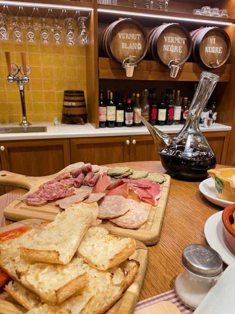 Girona Evening Food Tour & Tapas Bar Experience - Pont de les Peixateries Velles photo stop, plus short guided breaks that keep it fun