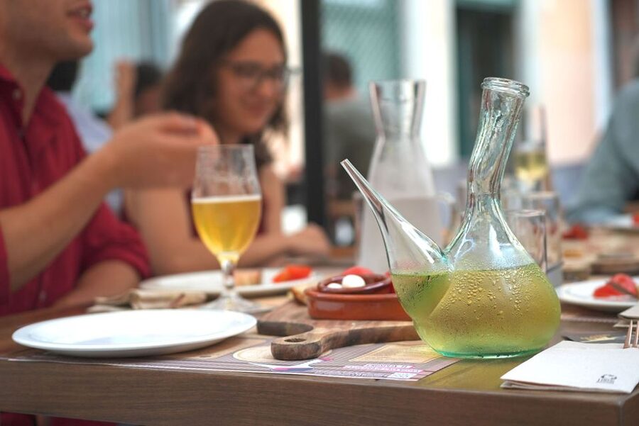 Girona: History and Gastronomy Small Group with Tastings - Entering Girona’s old quarter from Plaça de Sant Feliu