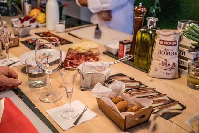 La Boqueria Market and Paella Cooking Class in Barcelona - Tapas with wine: the best warm-up before you cook