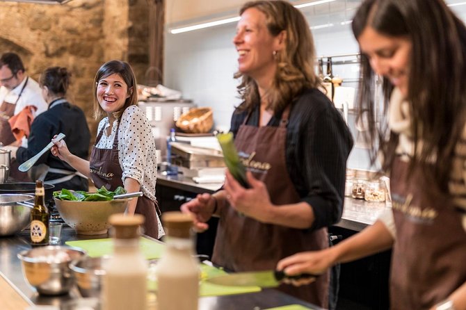 Market Gourmet Visit and Spanish Culinary Experience in Barcelona - Your Menu: Two Starters, Paella, and a Traditional Dessert