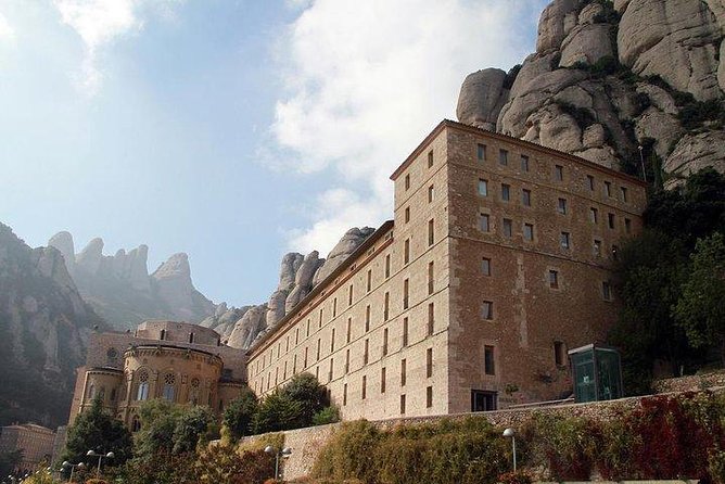Montserrat Day Trip Private or Small Group with Basilica Tickets - Stop 5: Mercat de Montserrat, Catalan Tastes, and Simple Souvenirs