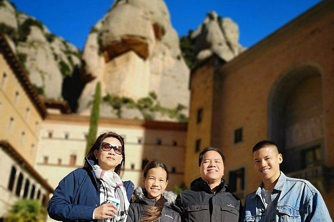 Montserrat Day Trip Private or Small Group with Basilica Tickets - Stop 2: Abadia de Montserrat and the Monastery Architecture Moment