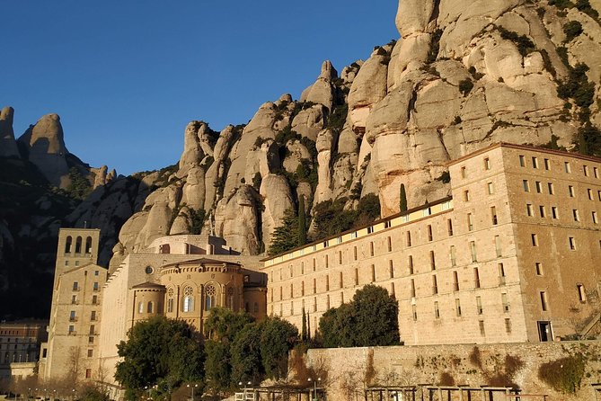 Montserrat Hiking Experience & Monastery Premium Small Group Tour - Meeting at Passeig de Gràcia, then climbing fast on a small van