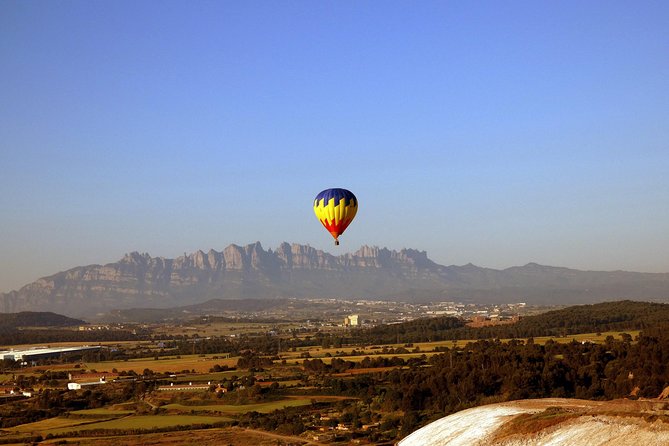 Montserrat Hot Air Balloon Flight from Barcelona - Champagne toast, sweet wine, and locally made cheese after landing