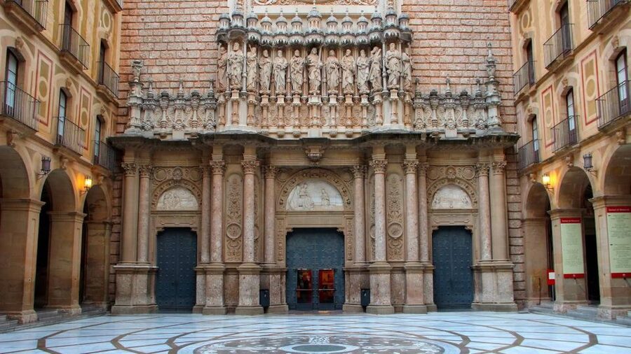 Montserrat: Morning or Afternoon Half-Day Trip with Pickup - Entering the Basilica of Montserrat and the Black Madonna