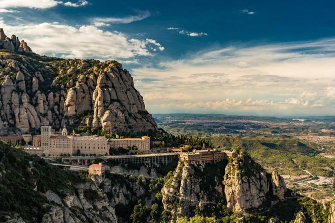 Montserrat Private Tour w/ Official Guide + Hotel or Port pick up - Luxury Transport and a Real Mountaintop Start