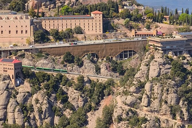 Montserrat Tour by Train with Cable Car and Cogwheel - Aeri de Montserrat cable car descent: the jaw-dropping part on the way down