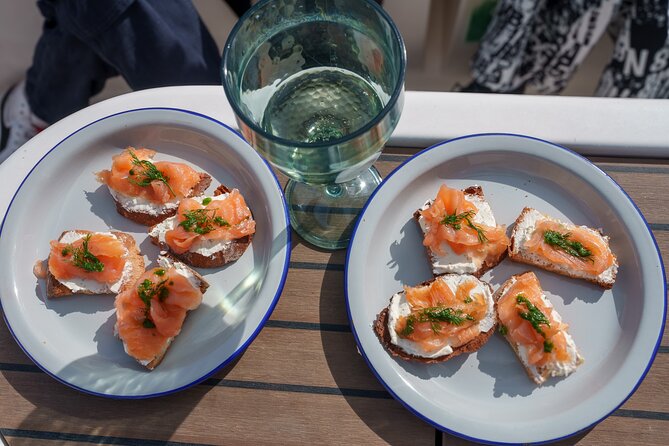Oyster Odyssey Barcelona's Premier Sailing and Seafood Adventure - Port Olimpic Launch Point: Fast Start, Big City Views