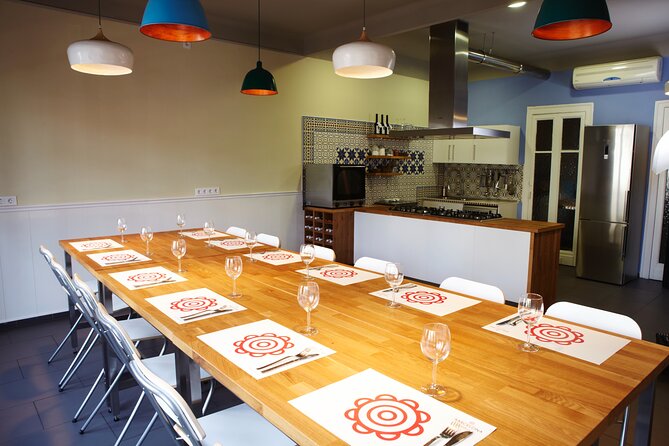 Paella Class & Bottomless Wine: Las Ramblas Views - The Multi-Course Menu: From Starters to Paella to Catalan Cream