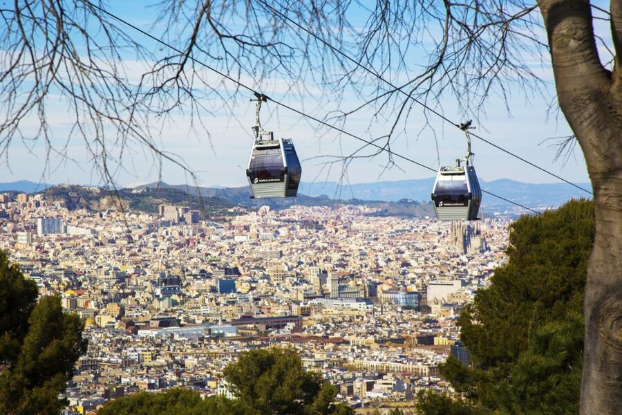Panoramic Barcelona and Montserrat Excursion - Montjuïc Castle area and the Olympic Stadium pass by history