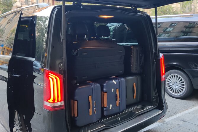Premium Transfer from / to Airport and Port - Sign-Holding Pickup at Barcelona El Prat (Where You Actually Meet)
