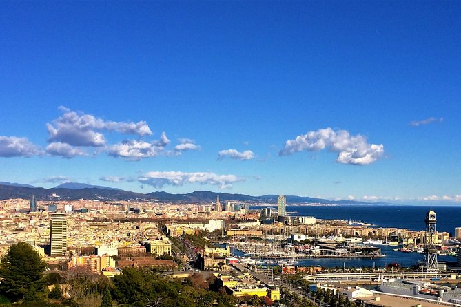 Private Barcelona and Sagrada Familia Tour with Hotel Pick-up - Las Ramblas to the coast: Columbus, Drassanes, and Port Vell atmosphere