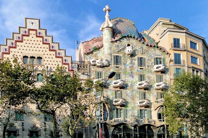 Private Barcelona Highlights Tour with Hotel pick-up - Olympic Stadium, harbor monuments, and the Port Vell contrast