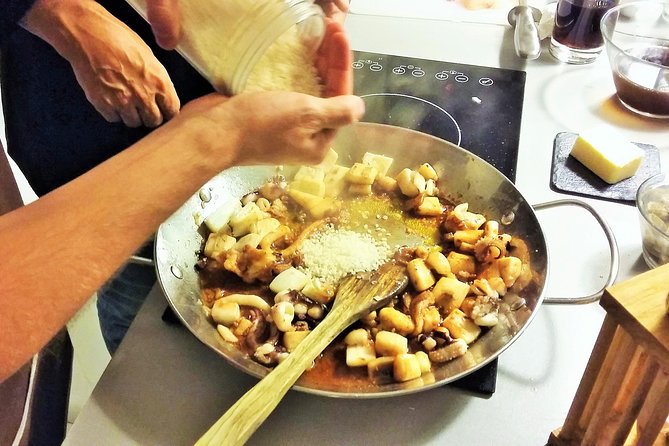 Private Paella class, Tapas, full menu and Sangria workshop - Entering the world of Spanish comfort food in Plaça Reial