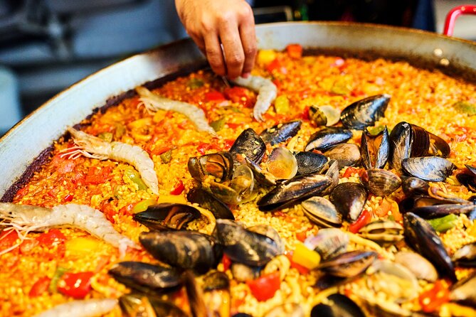 Private Paella Cooking Class and Market Visit with Personal Chef - Tapas, unlimited sangria, and how the meal stays social