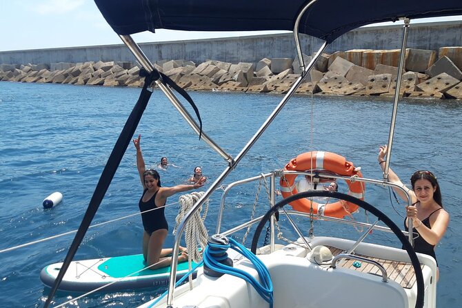 Private sailing and paddlesurfing tour with skipper up to 11 people - Barcelona coastline landmarks (Stop 4): Sagrada Familia, Montjuïc, and Agbar Tower from the sea