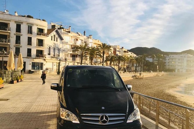 Private Transfer from Sitges to Barcelona Airport - Inside the vehicle: air-conditioning, bottled water, and kid options