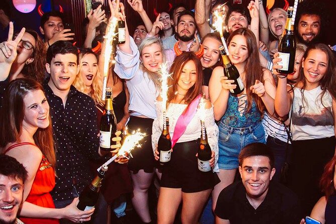 Pub Crawl Barcelona by EVOLVE The BEST night experience - Plaça Reial for two hours: one square, multiple bar moods