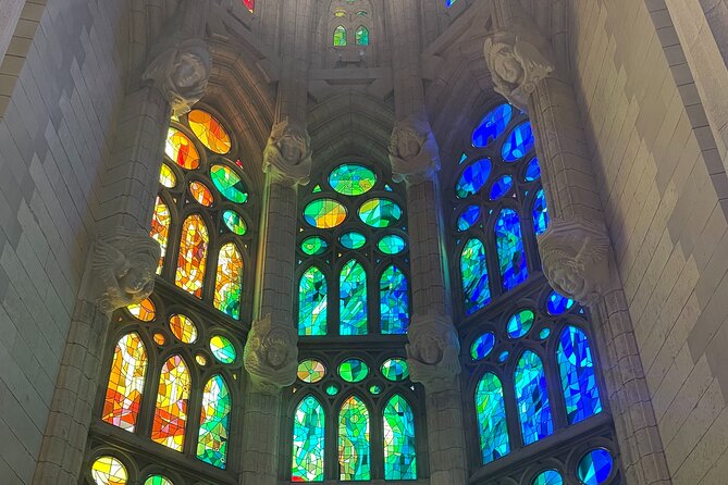 Sagrada Familia and Park Guell Guided Tour with Transport - Park Güell: Dragon Stairway, Rosary Path, and a View Worth the Climb