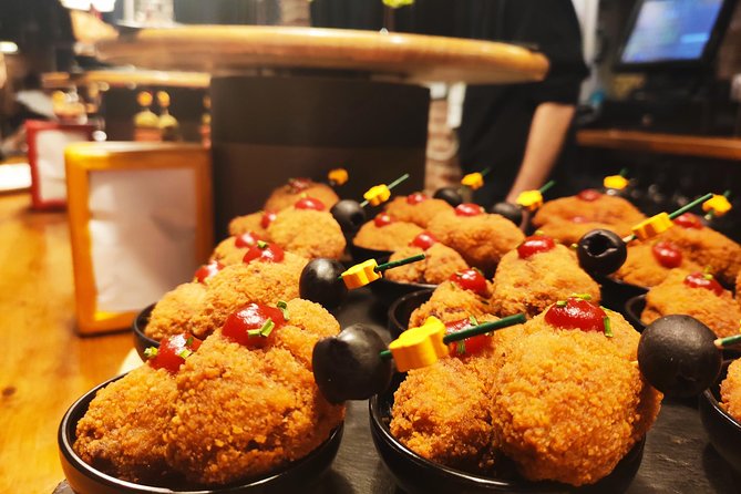 Spanish Wine and Tapas Tour in a Local Neighborhood in Barcelona - Stop-by-stop expectations, and where the pacing can feel rushed
