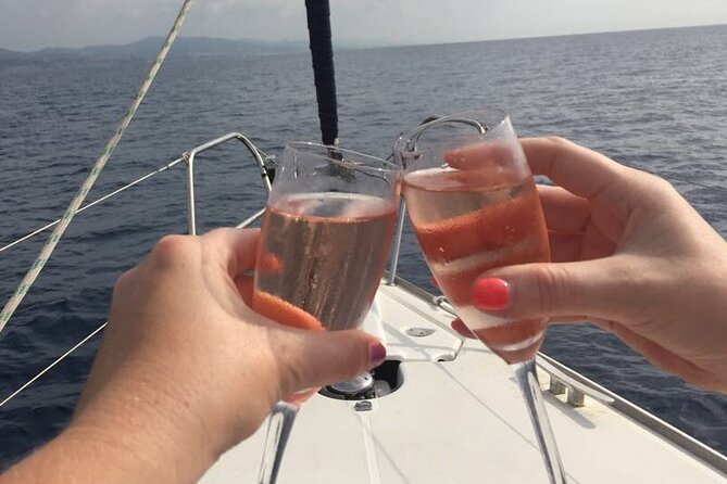 Sunset Sailboat Tour along the Coast with Open Bar - Sailing reality check: what if it turns into a motor-and-drift cruise?