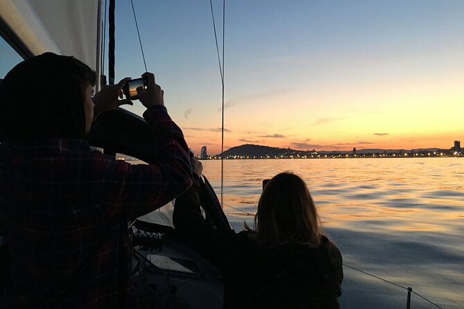 Sunset Sailboat Tour along the Coast with Open Bar - Drinks, music, and the social vibe onboard