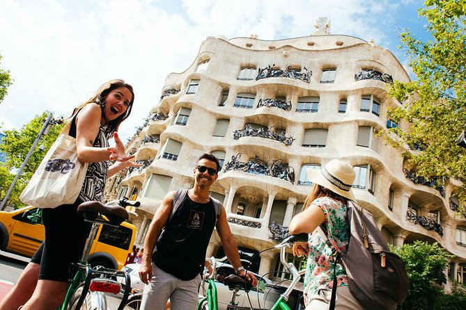 The Beauty of Barcelona by Bike: Private Tour - Plaça Reial and the Gaudí lanterns, where details pay off
