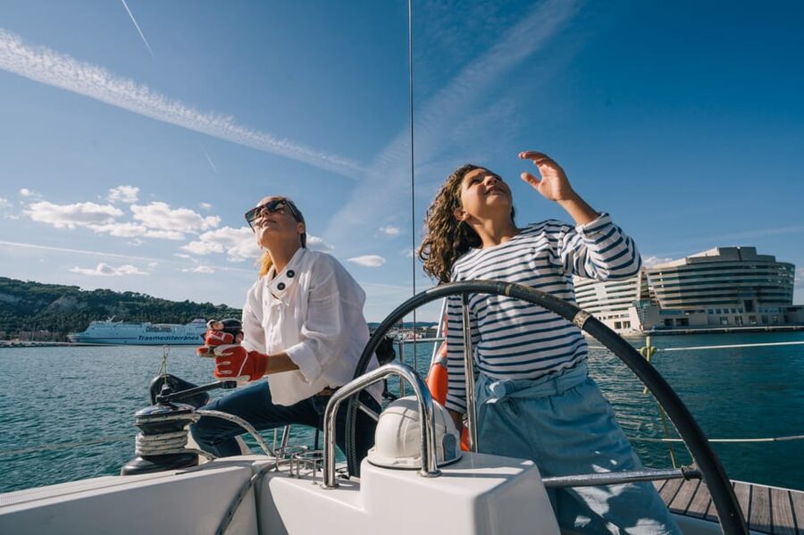 Two Hour Luxury Sailing Experience with Open Bar - What you see from sea level: Sagrada Familia, Montjuic, and the coast