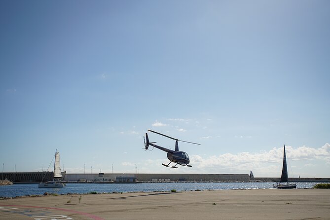 Unique Helicopter Flight with Optional Sailing Experience - Who Should Book This in Barcelona