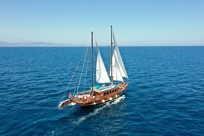 Wooden Boat Sailing with Tapa and Welcome Drink - The Sustainability Piece: Plastic Cleaning and Coral Planting